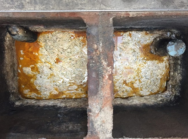 Bể lọc mỡ trong cống tự động.